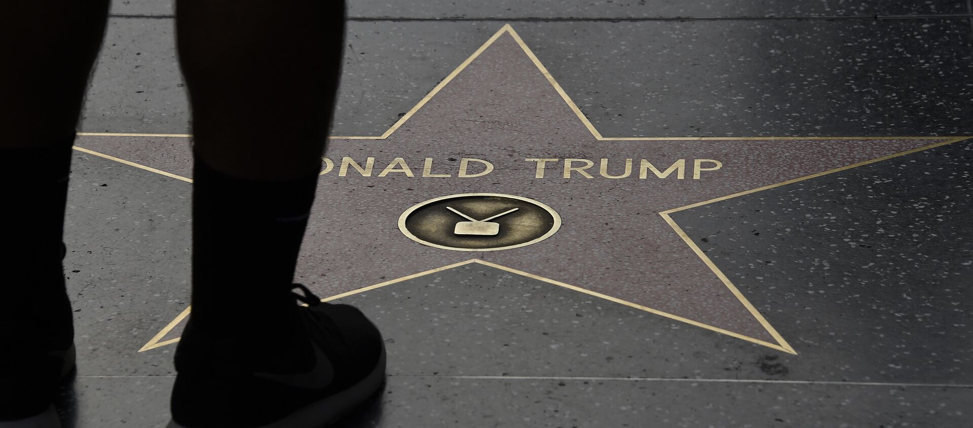 (File) Republican presidential candidate frontrunner Donald Trump's star on the Hollywood Walk of Fame in seen, September 10, 2015 in Hollywood, California - Sputnik Türkiye, 1920, 21.09.2018