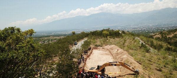 Palu'da deprem ve tsunami kurbanları için hazırlanan 1300 kişilik toplu mezar - Sputnik Türkiye