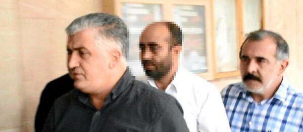 Sosyal medya hesabından Atatürk'e hakaret ettiği belirlenince gözaltına alınan öğretmen Murat K. - Sputnik Türkiye