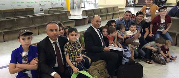 Aileleri IŞİD'e katılan Türk çocuklar Ankara'ya getirildi - Sputnik Türkiye