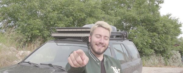 Enes Batur - Sputnik Türkiye