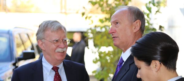 Russian Security Council Secretary Nikolai Patrushev (second from right) and US National Security Adviser John Bolton during a meeting in Moscow. - Sputnik Türkiye
