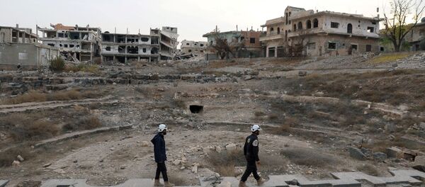 Beyaz Miğferler üyeleri, Aralık 2017'de Dera'daki Roma kalıntılarında - Sputnik Türkiye