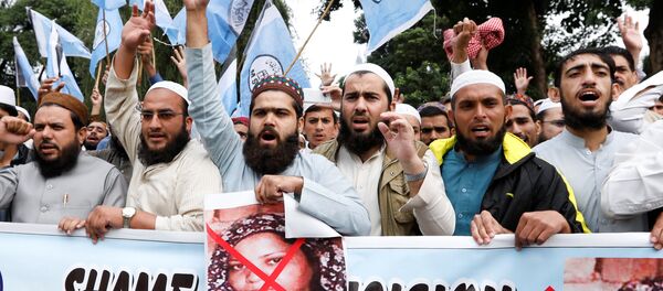 Pakistan'da Asya Bibi protestocuları arasındaki Müslüman Öğrenciler Birliği (MSO) mensupları - Sputnik Türkiye
