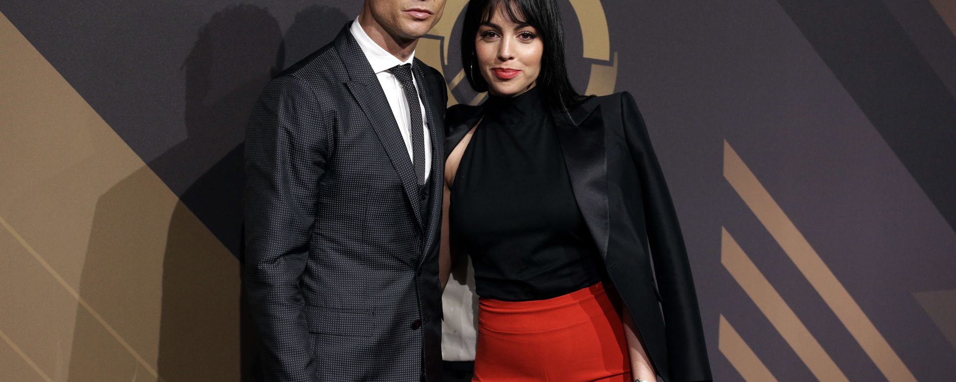 In this March 19, 2018 file photo, Real Madrid player Cristiano Ronaldo and his girlfriend Georgina Rodriguez pose for photos as they arrive for the Portuguese soccer federation awards ceremony in Lisbon - Sputnik Türkiye, 1920, 12.08.2025
