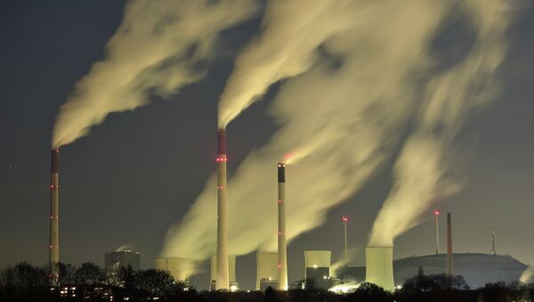 In this Monday, Nov. 24, 2014 file photo, smoke streams from the chimneys of the E.ON coal-fired power station in Gelsenkirchen, Germany - Sputnik Türkiye