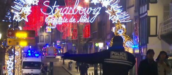 In this image made from video, emergency services arrive on the scene of a Christmas market in Strasbourg, France, Tuesday, Dec. 11, 2018 - Sputnik Türkiye