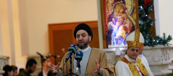 Bağdat'taki Aziz George Keldani Katolik Kilisesi'ndeki Noel ayinine, Irak İslami Yüksek Konseyi'nden ayrılıp Hikmet Hareketi'ni kuran Şii siyasetçi Ammar el Hekim de katıldı. - Sputnik Türkiye