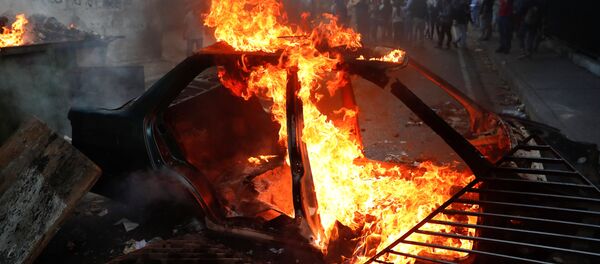 Karakas'ta protesto  gösterileri - Sputnik Türkiye