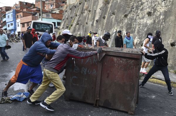 Karakas'ta protesto  gösterileri - Sputnik Türkiye