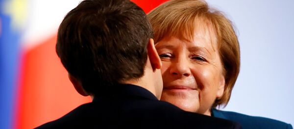 Fransa Cumhurbaşkanı Macron ve Almanya Başbakanı Merkel - Sputnik Türkiye