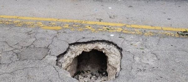 Obruk sanılan çukur, bankaya kazılan tünel çıktı - Sputnik Türkiye