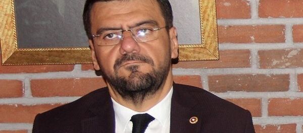 Tamer Akkal - Sputnik Türkiye