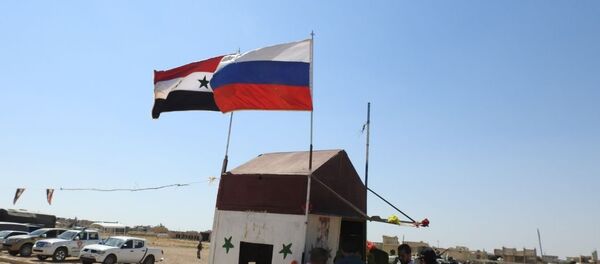 Suriye ve Rusya bayrakları - Sputnik Türkiye