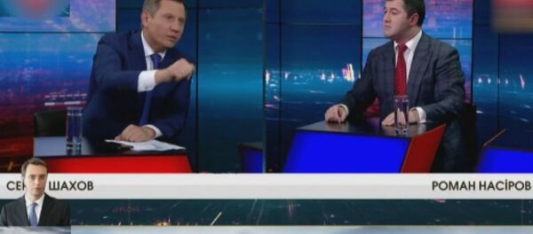 Canlı yayında Ukrayna başkan adayının yüzüne su fırlattı - Sputnik Türkiye