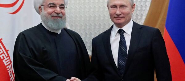 Rusya lideri Vladimir Putin ile İran Cumhurbaşkanı Hasan Ruhani - Sputnik Türkiye