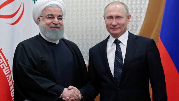 Rusya lideri Vladimir Putin ile İran Cumhurbaşkanı Hasan Ruhani - Sputnik Türkiye