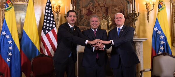 Kendisini Venezüella geçici Devlet Başkanı ilan eden Juan Guaido ve ABD Başkan Yardımcısı Mike Pence, Kolombiya'nın başkenti Bogota'da gerçekleştirilen Lima Grubu toplantısında bir araya geldi. - Sputnik Türkiye