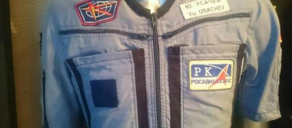 Rus kozmonotun yörüngede giydiği kostüm yarım milyona satışa çıkarıldı - Sputnik Türkiye