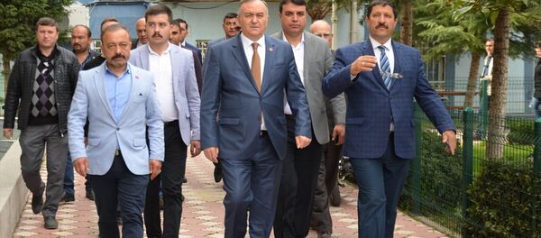 MHP Grup Başkanvekili Erkan Akçay (Ortada) - Sputnik Türkiye