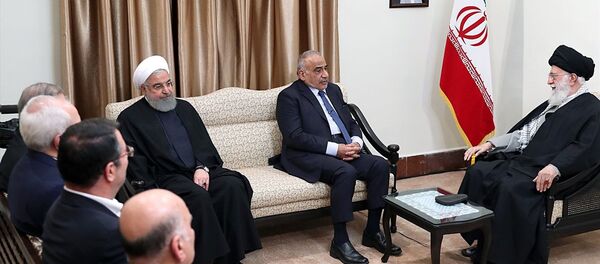 Irak Başbakanı Adil Abdulmehdi, İran lideri Ayetullah Ali Hamaney ve İran Cumhurbaşkanı Hasan Ruhani - Sputnik Türkiye