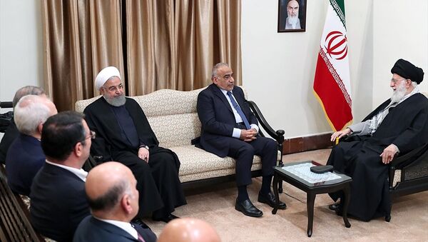 Irak Başbakanı Adil Abdulmehdi, İran lideri Ayetullah Ali Hamaney ve İran Cumhurbaşkanı Hasan Ruhani - Sputnik Türkiye