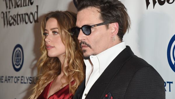 Johnny Depp'in 50 milyon dolarlık hakaret davasında Amber Heard'dan yanıt: Şiddet gerçek - Sputnik Türkiye