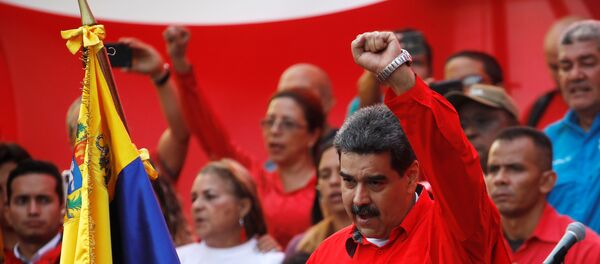 Venezüella Devlet Başkanı Nicolas Maduro, başkent Caracas kent merkezi Devlet Başkanlığı Sarayı Miraflores'in karşısındaki Sucre Bulvarında, 1 Mayıs Emek ve Dayanışma Günü kapsamında düzenlenen etkinlikte konuştu. Venezüella Devlet Başkanı Nicolas Maduro, başkent Caracas kent merkezi Devlet Başkanlığı Sarayı Miraflores'in karşısındaki Sucre Bulvarında, 1 Mayıs Emek ve Dayanışma Günü kapsamında düzenlenen etkinlikte konuştu. - Sputnik Türkiye