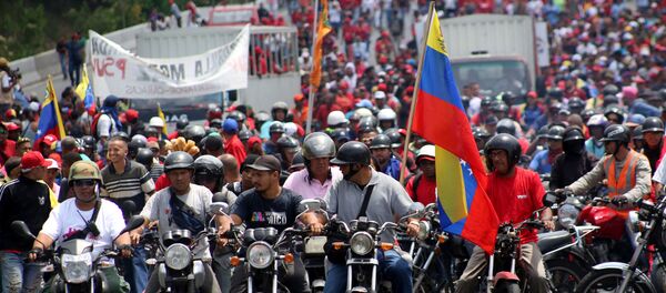 Venezüella'da Devlet Başkanı Nicolas Maduro'yu destekleyenler yürüyüş yaptı. Venezüella'da Devlet Başkanı Nicolas Maduro'yu destekleyenler yürüyüş yaptı. - Sputnik Türkiye