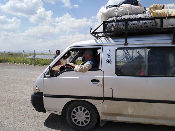 Türkiye'nin en büyük mülteci kampı kapatılıyor: Mültecilerden bazıları Suriye'ye döndü - Sputnik Türkiye