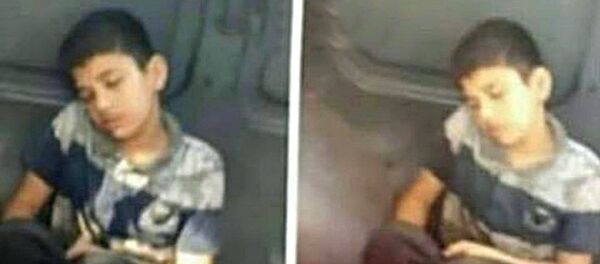  Üzeri kirli diye minibüste koltuğa oturtulmayan 12 yaşındaki Muhammed H. - Sputnik Türkiye