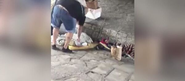 Evsizlerin üzerine alkol döktü, yaktı - Sputnik Türkiye