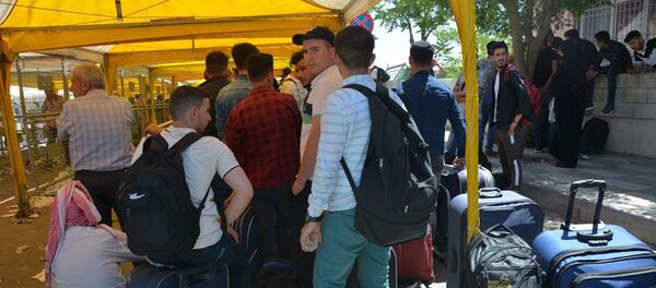 Suriyelilerin bayram için ülkelerine dönüşü sürüyor - Sputnik Türkiye