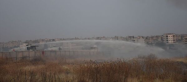 Mardin'in Nusaybin ilçesinde Suriye sınırındaki mayınlı alanda kuru otların tutuşması sonucu yangın çıktı. Yangın, TOMA'ların da kullanıldığı müdahaleyle söndürüldü. - Sputnik Türkiye
