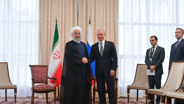  Rusya Devlet Başkanı Putin, Kırgızistan'ın başkenti Bişkek'teki Şanghay İşbirliği Örgütü (ŞİÖ) toplantısı kapsamında İran lideri Ruhani ile görüştü. - Sputnik Türkiye