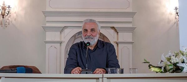 Hasan Kaçan - Sputnik Türkiye