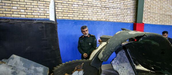 İran, vurduğu ABD İHA'sının enkazını kamuoyuna sundu. İran, vurduğu ABD İHA'sının enkazını kamuoyuna sundu. - Sputnik Türkiye