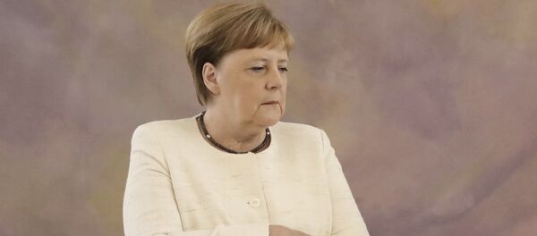 Almanya Başbakanı Angela Merkel yine titrerken görüldü Almanya Başbakanı Angela Merkel yine titrerken görüldü - Sputnik Türkiye