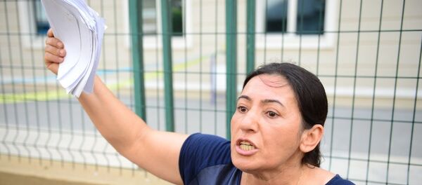 Adana'da, şiddet gördüğünü iddia ettiği 51 yaşındaki eşi Cerrah K.'den mahkemelerin ret kararları yüzünden boşanamayan 45 yaşındaki Meryem K - Sputnik Türkiye