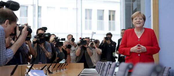 Almanya Başbakanı Angela Merkel - yıllık yaz dönemi basın toplantısı - Sputnik Türkiye