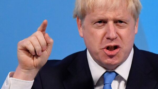 Boris Johnson Muhafazakar Parti lideri seçilerek İngiltere Başbakanı konumuna gelmesinin ardından ilk konuşmasını yaparken, 23 Temmuz 2019. REUTERS/Toby Melville - Sputnik Türkiye