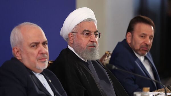İran Dışişleri Bakanı Muhammed Cevad Zarif ve Cumhurbaşkanı Hasan Ruhani - Sputnik Türkiye
