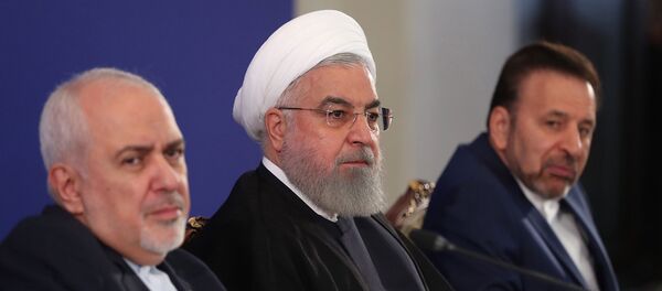 İran Dışişleri Bakanı Muhammed Cevad Zarif ve Cumhurbaşkanı Hasan Ruhani - Sputnik Türkiye