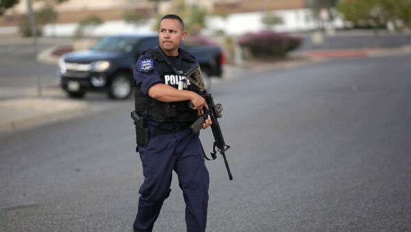 A police officer is seen after a mass shooting at a Walmart in El Paso, Texas, U.S. August 3, 2019. - Sputnik Türkiye