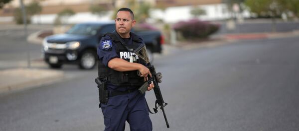 A police officer is seen after a mass shooting at a Walmart in El Paso, Texas, U.S. August 3, 2019. - Sputnik Türkiye