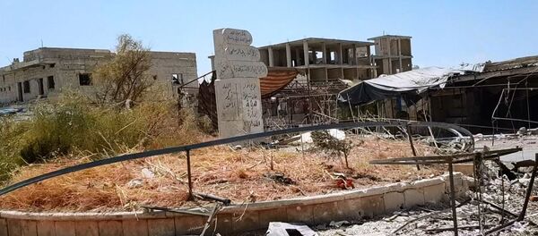 Suriye ordusunun kurtardığı Han Şeyhun'dan ilk görüntüler - Sputnik Türkiye