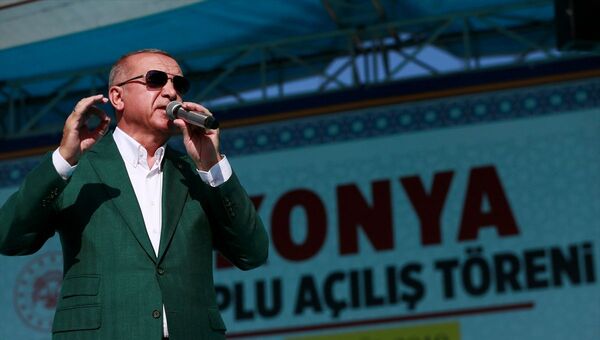 Cumhurbaşkanı Recep Tayyip Erdoğan, Konya Mevlana Meydanı'ndaki Toplu Açılış Töreni'nde konuştu. - Sputnik Türkiye