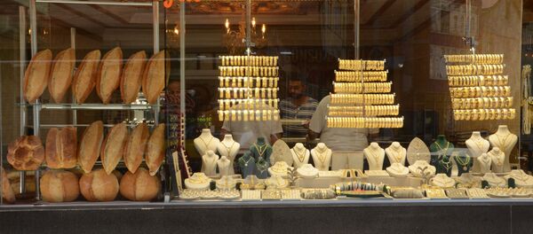 Ekmek satan kuyumcu Ekmek satan kuyumcu - Sputnik Türkiye