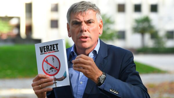 Belçika’nın kuzeyindeki Flaman bölgesinin bağımsızlığını savunan, göçmen karşıtı ve aşırı sağcı Vlaams Belang (Flaman Menfaati) Partisi’nin lideri Filip Dewinter - Sputnik Türkiye