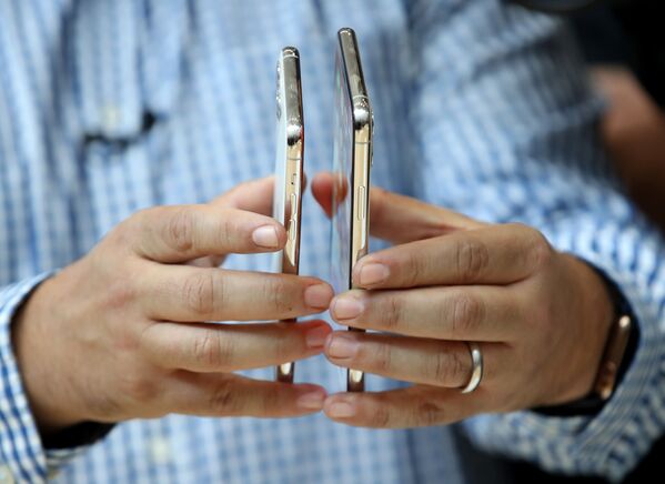 Apple, iPhone 11 modellerini tanıttı - Sputnik Türkiye